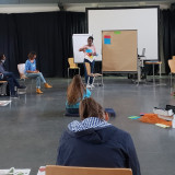 Julie Onyango hielt eine Präsentation zur Geschichte und Umsetzung der Menschenrechte
