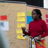 A seminar leader teaches a group of students. (Photo: Henry Sowinski)